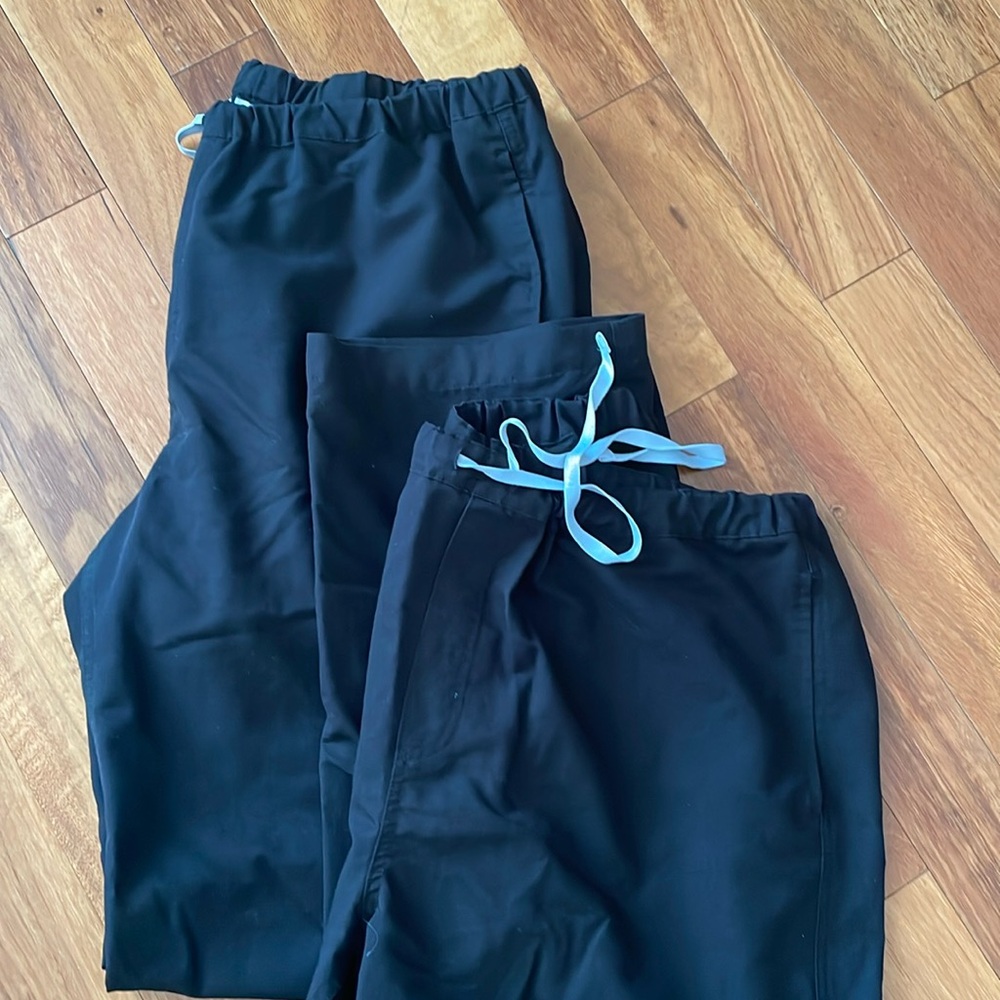 Two men’s FIGS drawstring scrub pants
